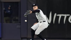 NEW YORK, NEW YORK - OCTOBER 30: Aaron Judge #99 of the New York Yankees drops a routine fly ball hit by Tommy Edman #25 of the Los Angeles Dodgers during the fifth inning of Game Five of the 2024 World Series at Yankee Stadium on October 30, 2024 in the Bronx borough of New York City.   Elsa/Getty Images/AFP (Photo by ELSA / GETTY IMAGES NORTH AMERICA / Getty Images via AFP)