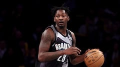 Dorian Finney-Smith #28 of the Brooklyn Nets dribbles the ball against the San Antonio Spurs during the second half at Barclays Center on December 27, 2024 in New York City.